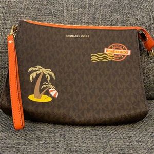 Brown embellished Micheal Kors Clutch